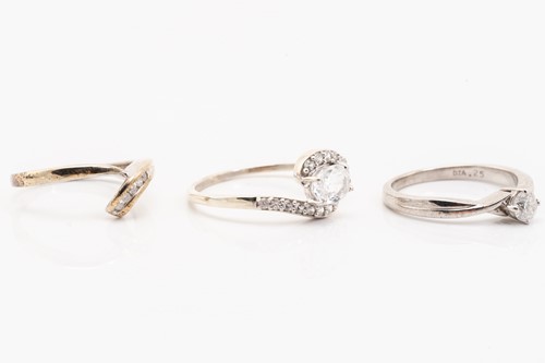 Lot 173 - Three gem-set rings in 9ct white gold;...