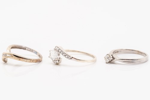 Lot 173 - Three gem-set rings in 9ct white gold;...
