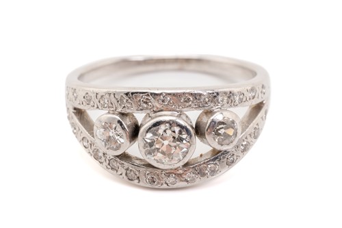 Lot 205 - A white metal bombe style diamond set ring,...
