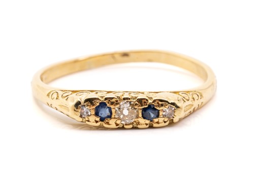 Lot 132 - An 18ct yellow gold, sapphire and diamond half-...
