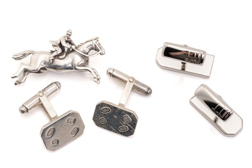 Lot 102 - A pair of Mappin & Webb silver cufflinks, a...