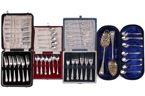 Lot 475 - A collection of four boxes of flatware...
