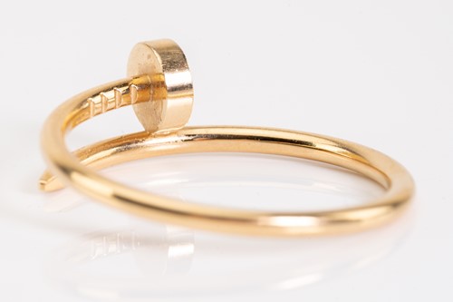 Lot 86 - Cartier - a Juste en Clou ring in 18ct yellow...