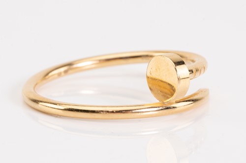 Lot 86 - Cartier - a Juste en Clou ring in 18ct yellow...