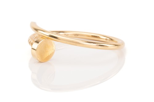 Lot 86 - Cartier - a Juste en Clou ring in 18ct yellow...