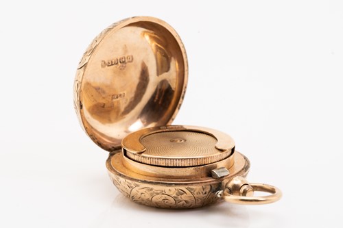 Lot 73 - A 9ct gold sovereign case with a Victorian...