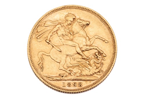 Lot 73 - A 9ct gold sovereign case with a Victorian...