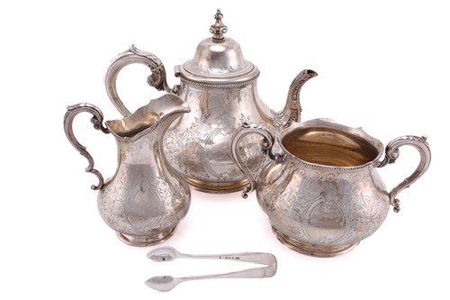 Lot 466 - A Victorian silver three-piece tea service and...