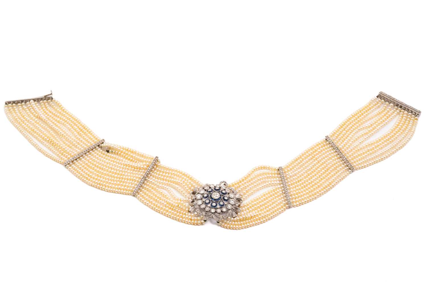 Lot 110 - A Belle Époque diamond, sapphire and seed...