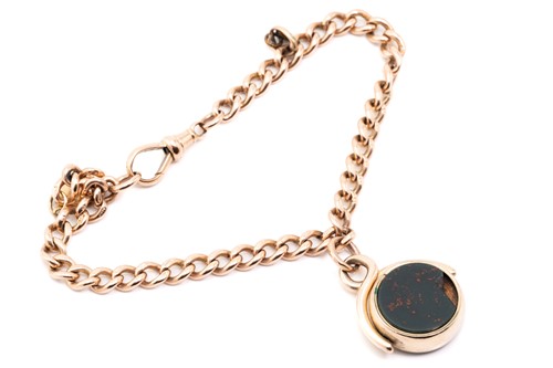 Lot 303 - A 9ct gold swivel fob charm on curb link...