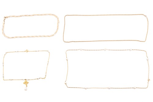 Lot 308 - Four necklaces including a 14ct yellow gold...