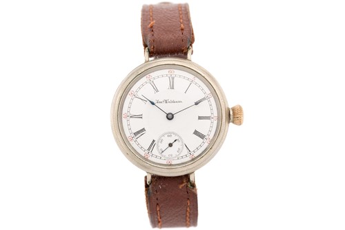 Lot 384 - A Waltham trench watch, featuring an...
