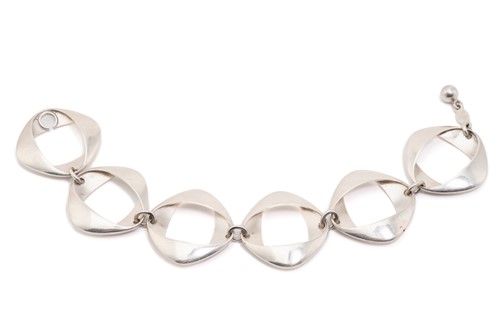 Lot 323 - Georg Jensen - A bracelet with six oval-shaped...