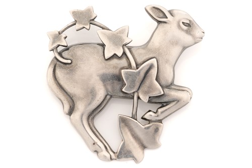 Lot 327 - Georg Jensen- A brooch cast with a lamb and...