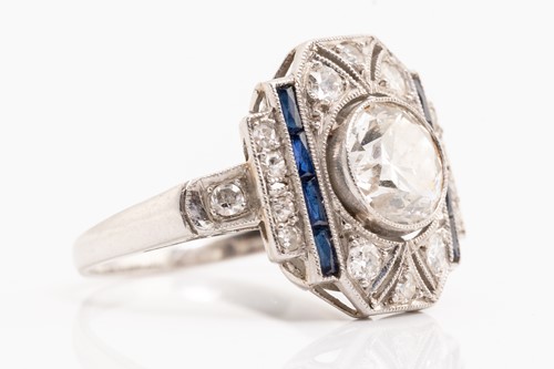 Lot 20 - An Art Deco diamond sapphire panel ring,...