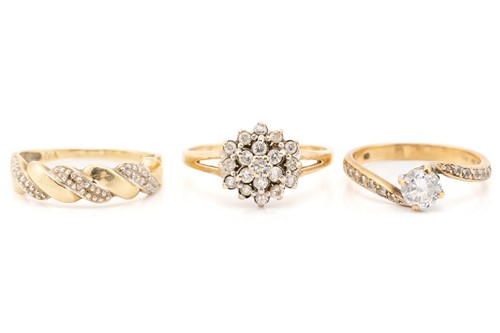 Lot 49 - three gem-set rings, including a diamond-set...