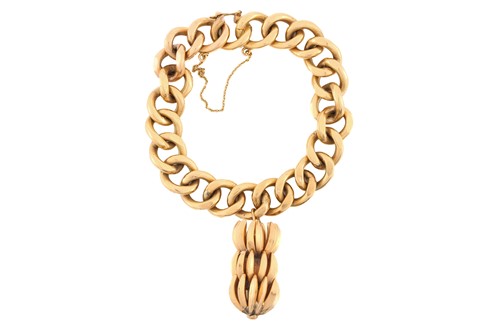 Lot 180 - A heavy curb link bracelet with a banana bunch...