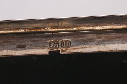 Lot 93 - Guild of Handicraft Ltd: a silver cigarette...