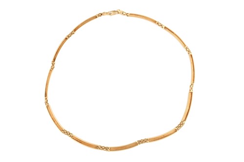 Lot 4 - A fancy link necklace with curved bars and...