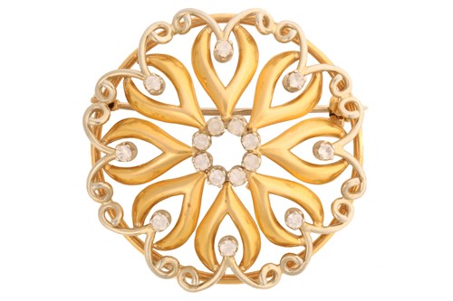 Lot 6 - A continental scrollwork brooch embellished...