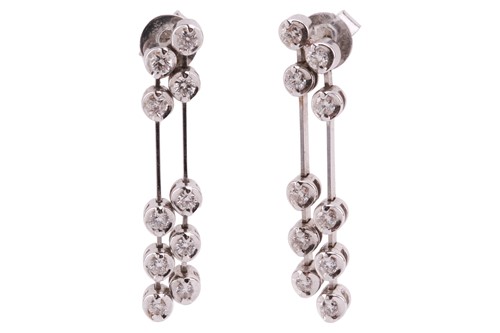 Lot 54 - A pair of diamond drop earrings in 18ct white...