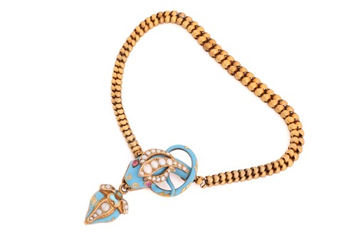 Lot 181 - A Victorian gold, enamel, pearl and ruby snake...