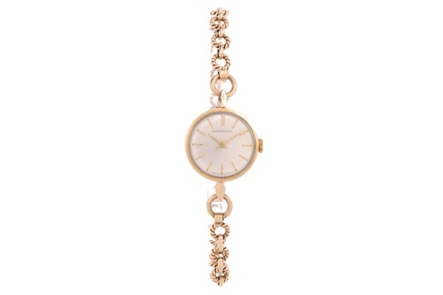 Lot 385 - A Garrard 9ct gold ladies wristwatch, the...