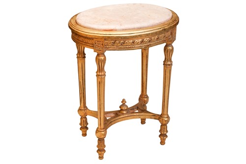 Lot 185 - A Louis XVI style marble-topped oval giltwood...