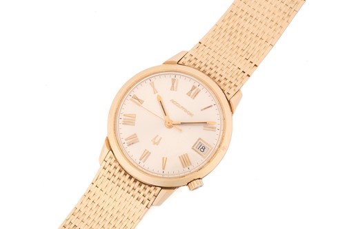 Lot 342 - An 18ct gold Bulova Accutron wristwatch, the...