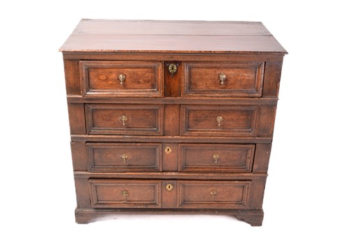 Lot 204 - A Charles II oak two-section chest of four...