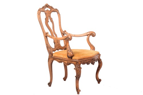 Lot 186 - An 18th-century Venetian style carved walnut...