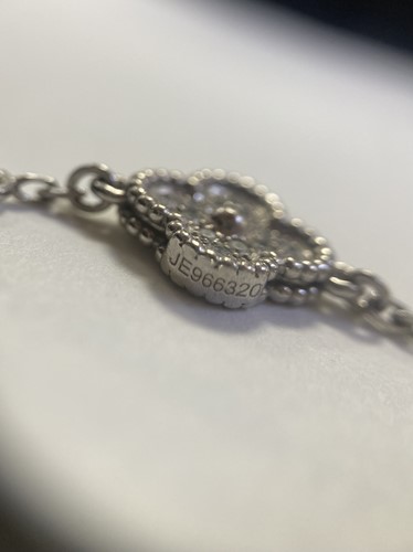 Lot 208 - A Van Cleef and Arpels alhambra diamond...