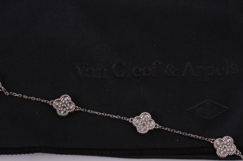 Lot 208 - A Van Cleef and Arpels alhambra diamond...
