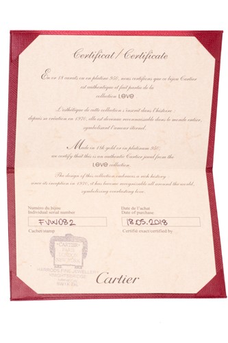 Lot 179 - Cartier - An 18ct white gold and diamond 'Love'...
