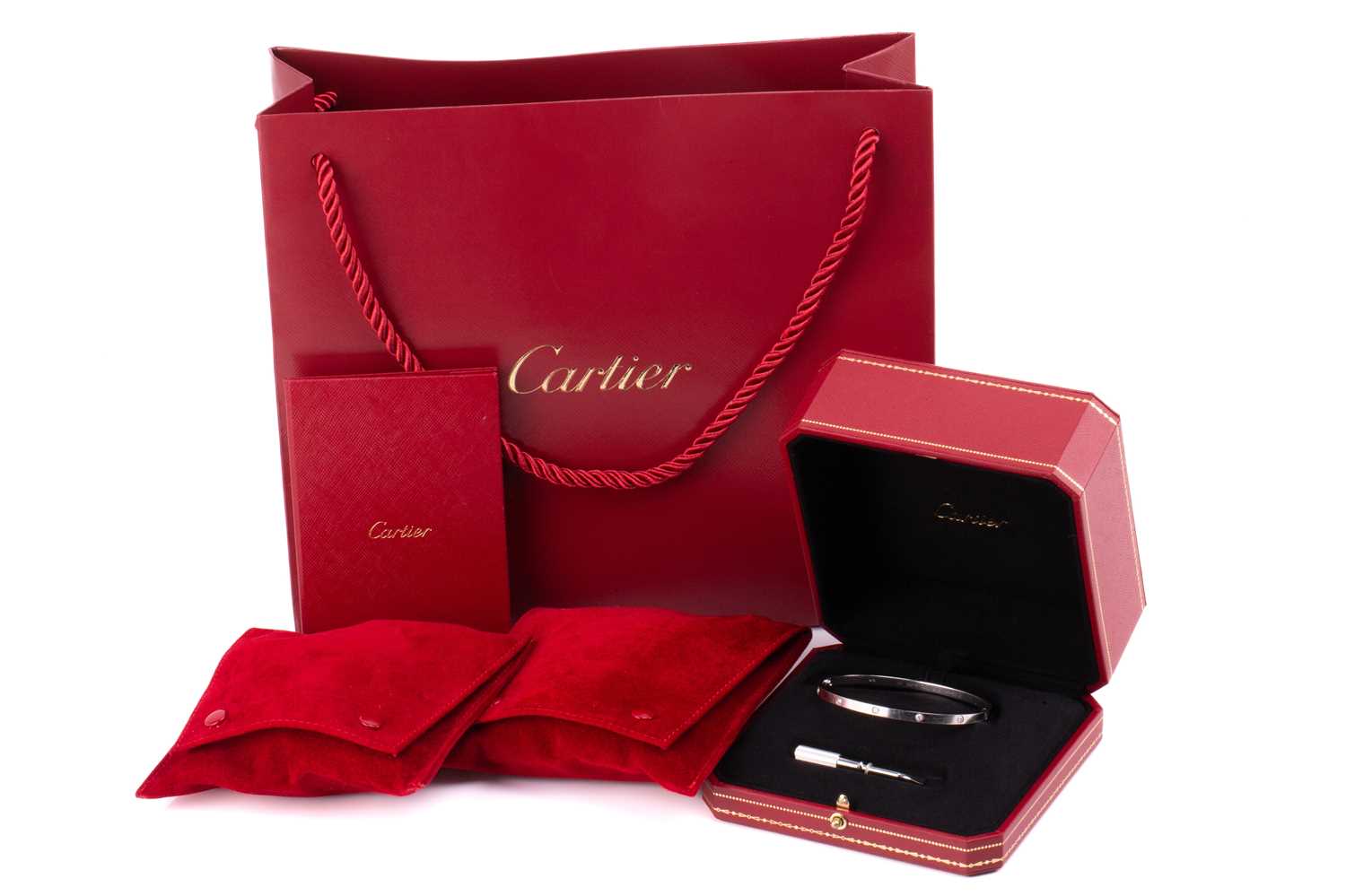 Lot 179 - Cartier - An 18ct white gold and diamond 'Love'...