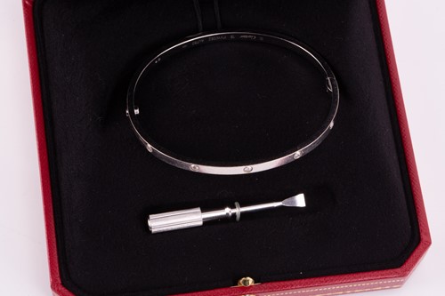 Lot 179 - Cartier - An 18ct white gold and diamond 'Love'...