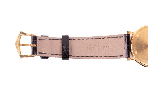 Lot 345 - A Patek Philippe Calatrava 18k yellow gold...