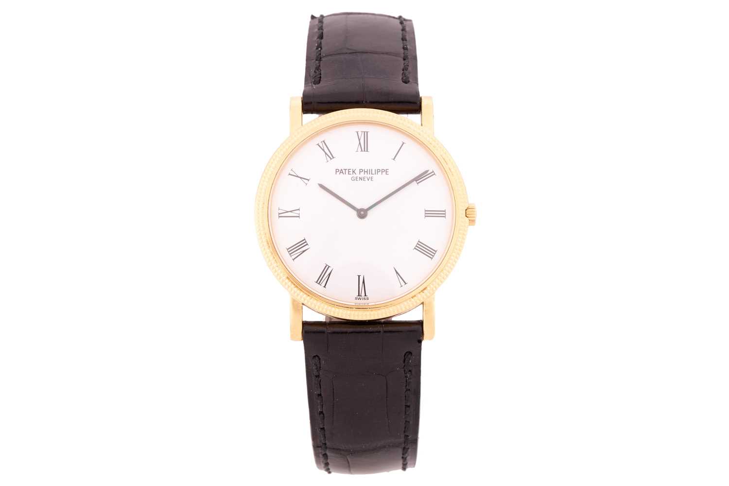 Lot 345 - A Patek Philippe Calatrava 18k yellow gold...