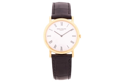 Lot 345 - A Patek Philippe Calatrava 18k yellow gold...