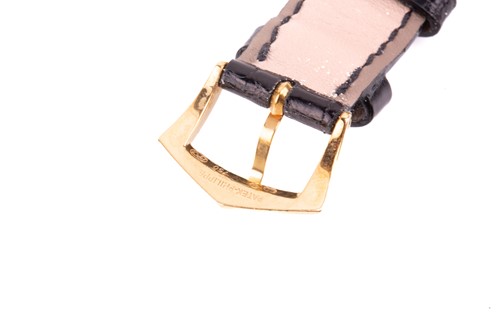 Lot 345 - A Patek Philippe Calatrava 18k yellow gold...