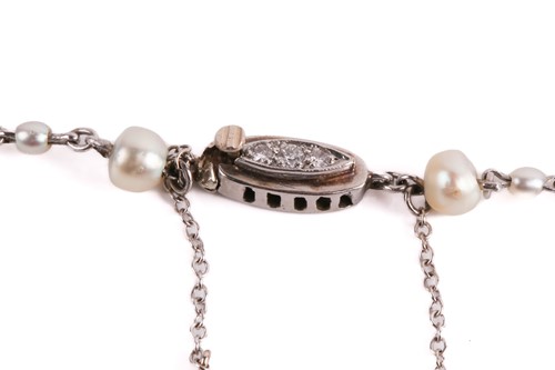 Lot 107 - An Art Deco chain necklace set with pearls and...