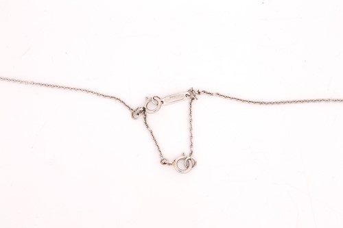 Lot 226 - Tiffany & Co. - a brilliant-cut solitaire...