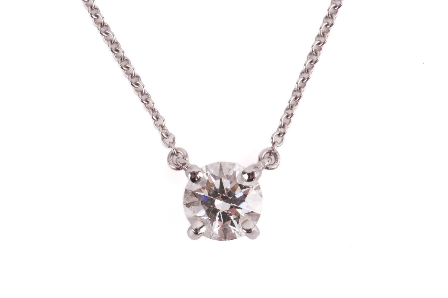 Lot 226 - Tiffany & Co. - a brilliant-cut solitaire...