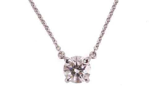 Lot 226 - Tiffany & Co. - a brilliant-cut solitaire...