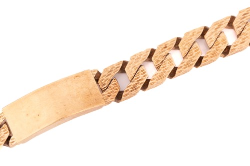 Lot 77 - A heavy 9ct yellow gold ID bracelet,...