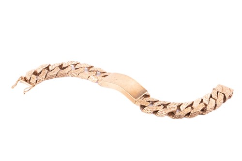 Lot 77 - A heavy 9ct yellow gold ID bracelet,...