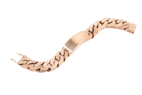 Lot 77 - A heavy 9ct yellow gold ID bracelet,...