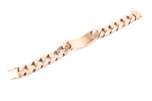 Lot 77 - A heavy 9ct yellow gold ID bracelet,...