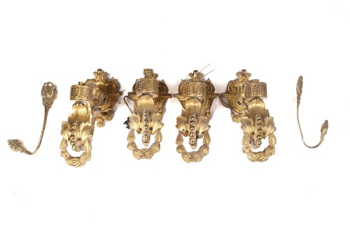 Lot 250 - A set of four French ormolu single-sconce wall...