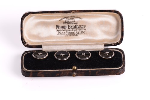 Lot 24 - A set of four onyx and white metal dress...